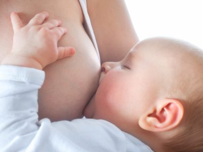 bigstock-mother-is-breast-feeding-her-b-74589406